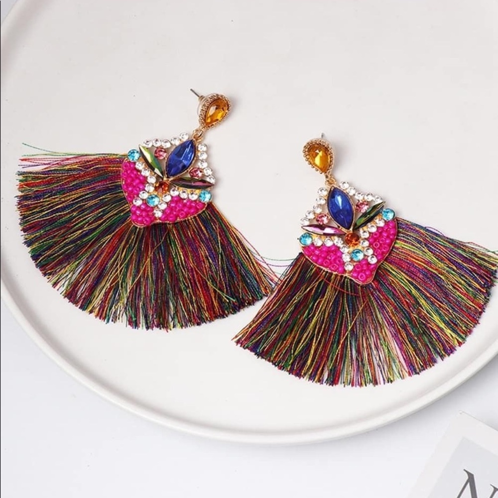 SOLD Aretes de hilo